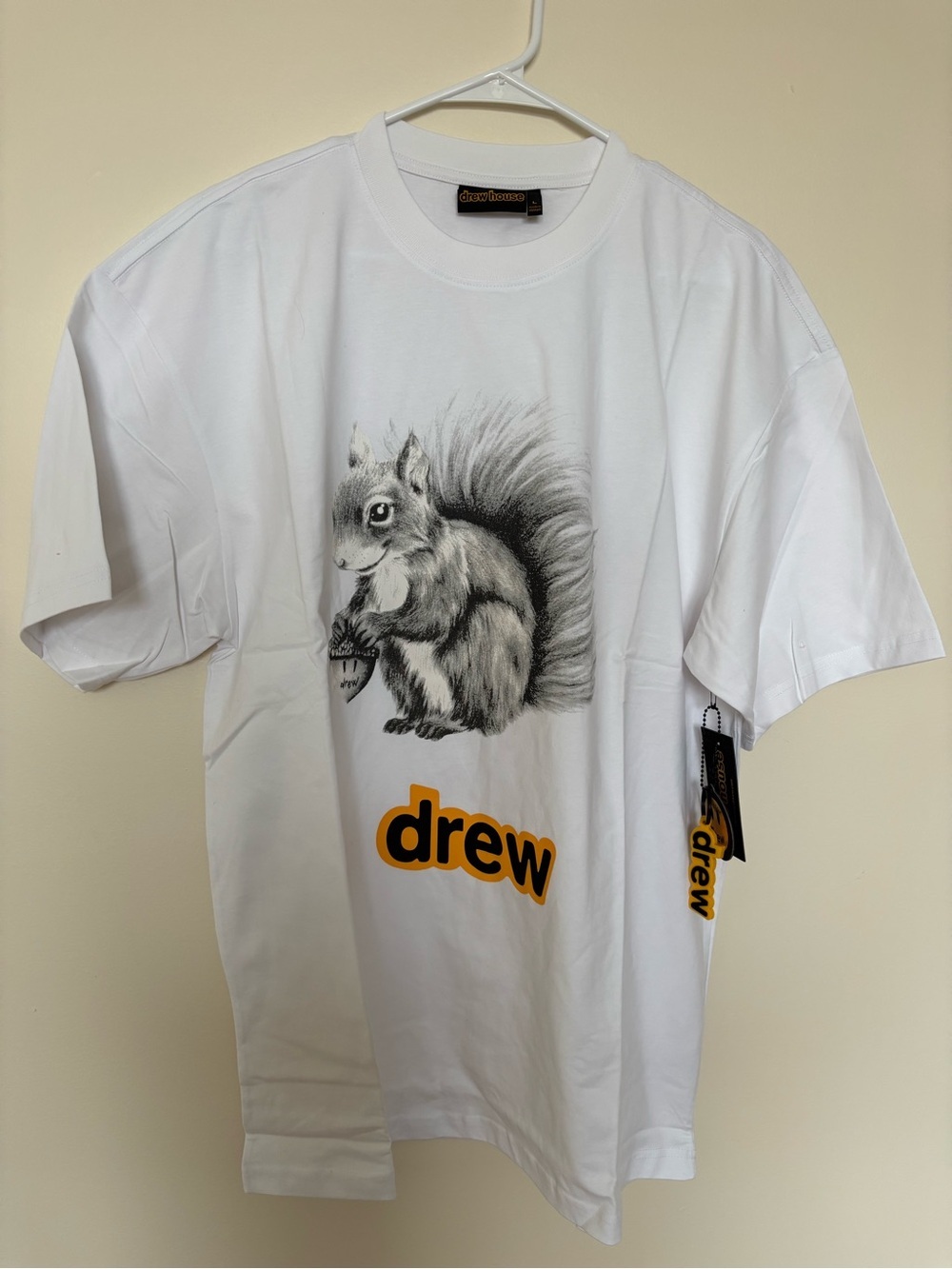 NWT drew house White Tee with Grey Squirrel Graphic and Yellow Logo